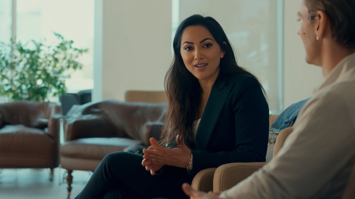 Fay Alizai in a one-on-one conversation during a mediation session